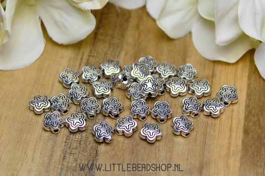 Spacer beads Flowers silver color, +/-30 pieces