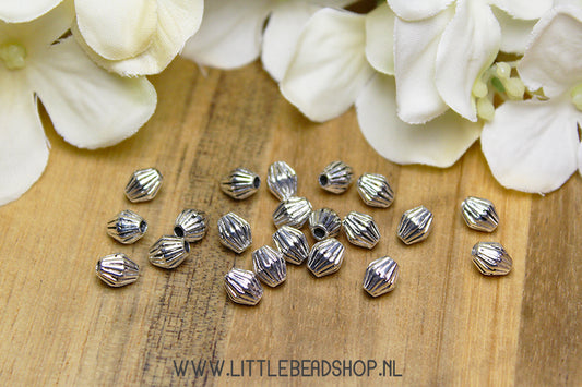 Silver-colored diamond spacer beads, +/-20 pieces