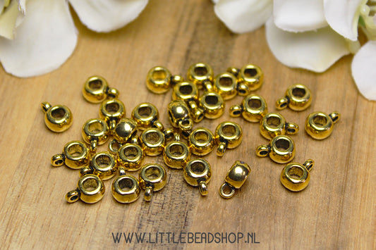 Basic spacer beads with gold-colored eye, +/- 30 pieces