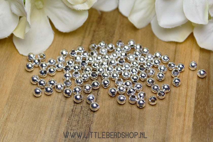 Tussenkralen Metalen balletjes 4mm zilverkleur, +/- 200 stuks