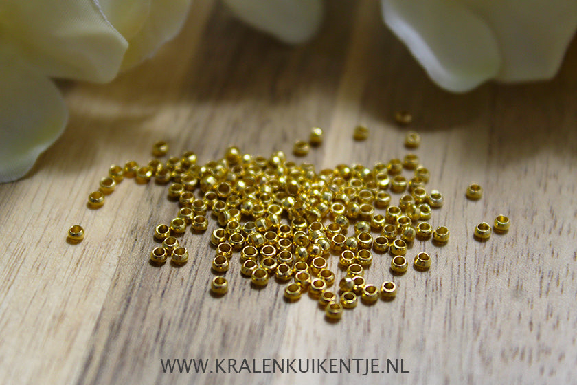 Knijpkralen goudkleur 2mm, 5 gram