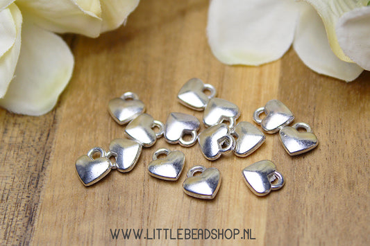 Small heart charms, silver color, per piece