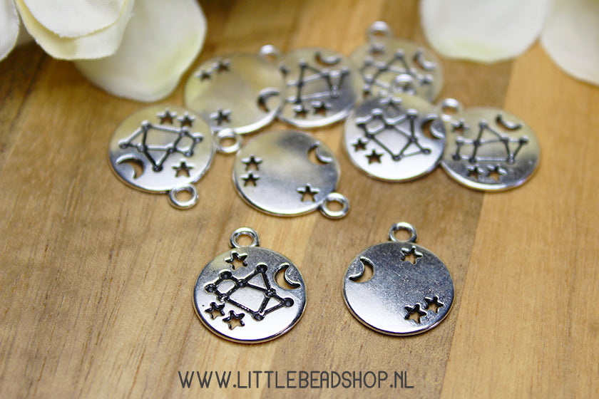 Silver-colored galaxy charms, per piece
