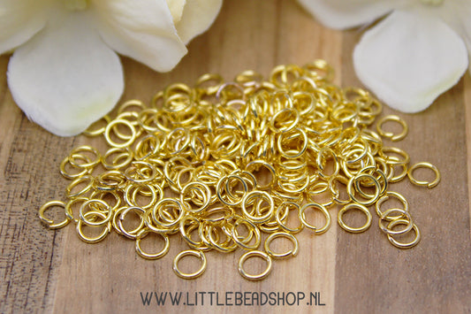 Gold-colored jump rings 5mm, 10 grams