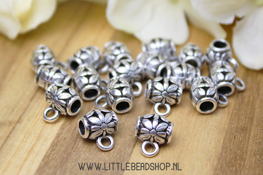 Spacer beads with eye flower silver color, per piece
