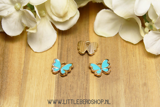 Emaille Bedels Vlinder Licht Blauw, per stuk