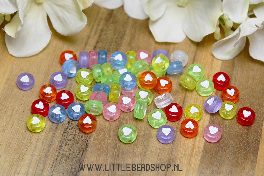 OP = OP Hartjes Kralen Transparant / Wit 7mm, +/- 100 stuks