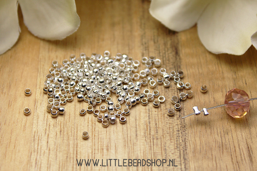 Knijpkralen zilverkleur 2mm, 5 gram