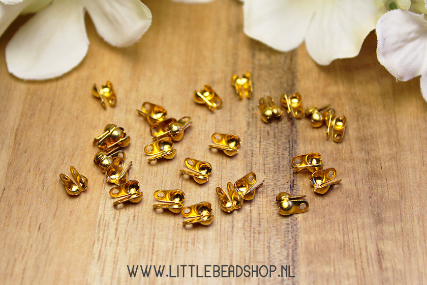 Gold-colored caps 6x3mm, +/- 80 pieces