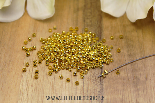 Knijpkralen goudkleur 2mm, 5 gram