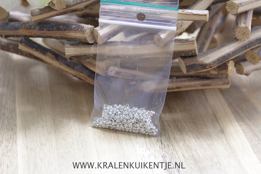 Knijpkralen zilverkleur 2mm, 5 gram